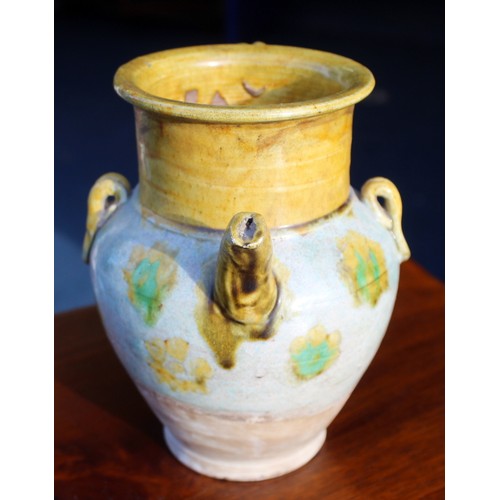 144 - Early Chinese, possibly Tang dynasty, pottery ewer, part yellow glazed, 18cm high and a brown glazed... 