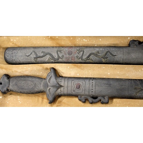 158 - Rare Chinese ink blocks in the form of a pair of swords, fitted box. Late Qing, early 20th century. ... 