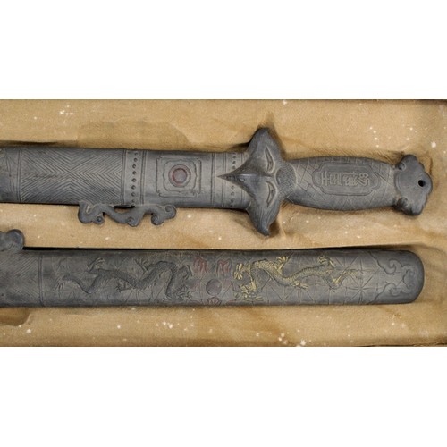 158 - Rare Chinese ink blocks in the form of a pair of swords, fitted box. Late Qing, early 20th century. ... 