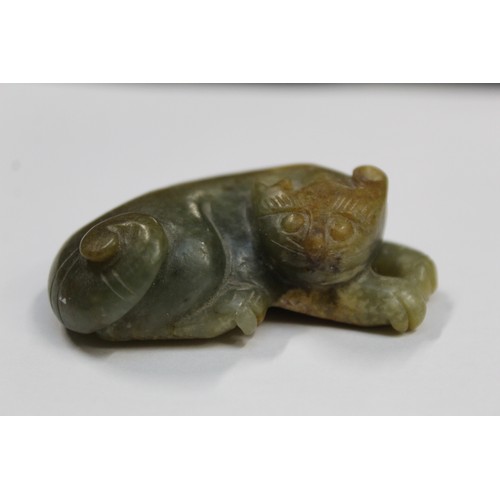 179 - Three Chinese archaic and archaised jade figures to include a repose cat figure, a rectangular toggl... 