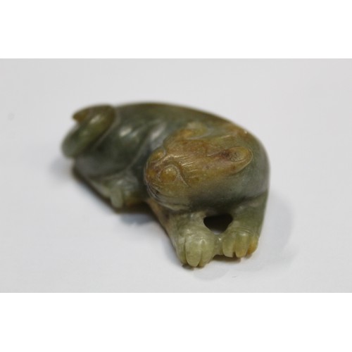 179 - Three Chinese archaic and archaised jade figures to include a repose cat figure, a rectangular toggl... 