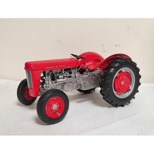 68 - Two Universal Hobbies boxed 1:16 scale model tractors to include a limited edition 1958 Massey Fergu... 