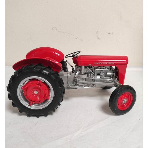 68 - Two Universal Hobbies boxed 1:16 scale model tractors to include a limited edition 1958 Massey Fergu... 