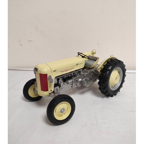 68 - Two Universal Hobbies boxed 1:16 scale model tractors to include a limited edition 1958 Massey Fergu... 