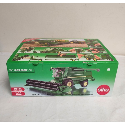 70 - Siku Farmer 4254 1:32 John Deere T670i combine harvester set with trailer and reaper (3) 