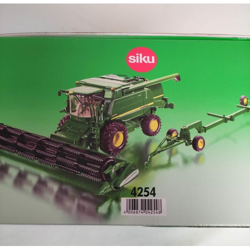 70 - Siku Farmer 4254 1:32 John Deere T670i combine harvester set with trailer and reaper (3) 