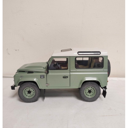 73 - Kyosho boxed 1:18 scale Land Rover Defender 90 Heritage in Grasmere green. Metal construction with b... 