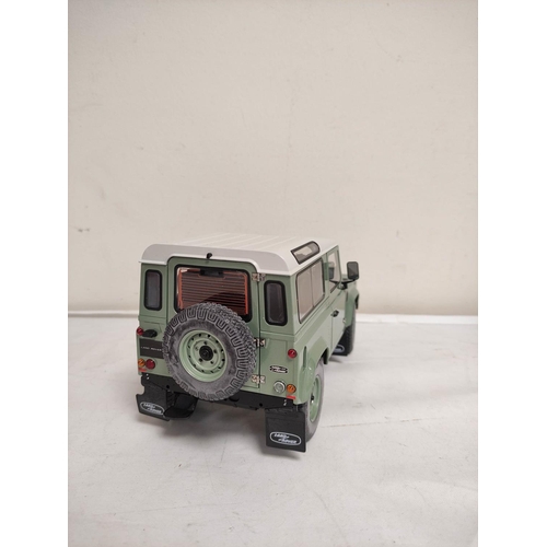 73 - Kyosho boxed 1:18 scale Land Rover Defender 90 Heritage in Grasmere green. Metal construction with b... 