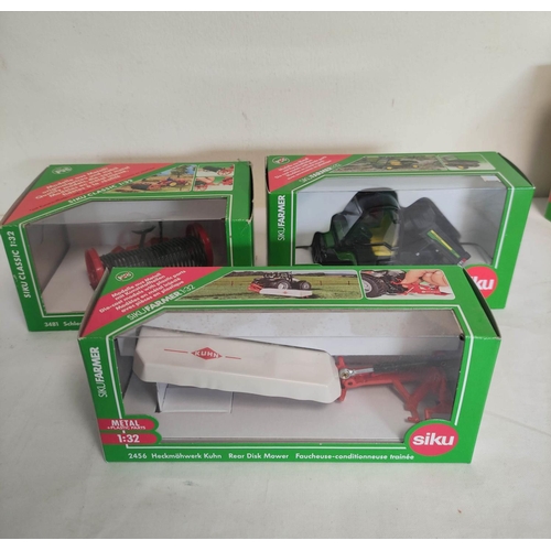 63 - Quantity of Siku 1:32 scale boxed agricultural implements  to include a fodder mixing wagon 245... 