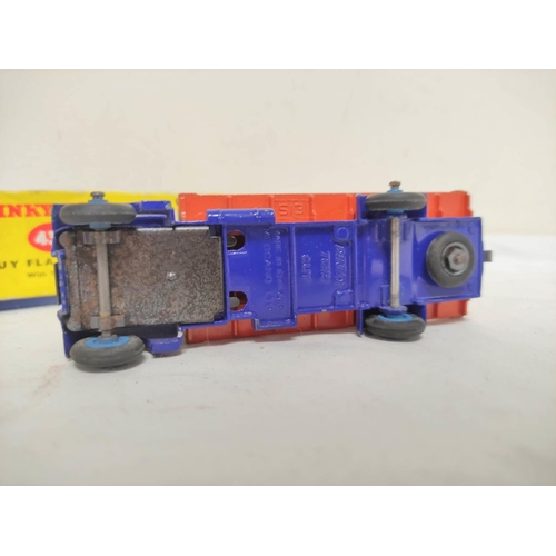 24 - Collection of vintage model toys to include eight boxed Dinky vehicles such as a Dinky Flat Truck 43... 