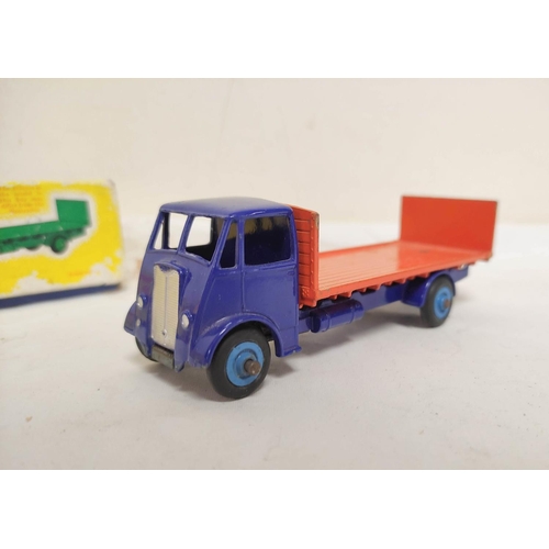 24 - Collection of vintage model toys to include eight boxed Dinky vehicles such as a Dinky Flat Truck 43... 