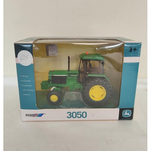 61 - Two boxed 1:32 scale Britains model tractors to include John Deere 3050 42902 & a Case IH 1056XL... 