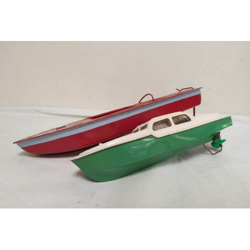 29 - Vintage 1950s clockwork and friction powered toys to include a Tri-ang Burnham model boat in plastic... 