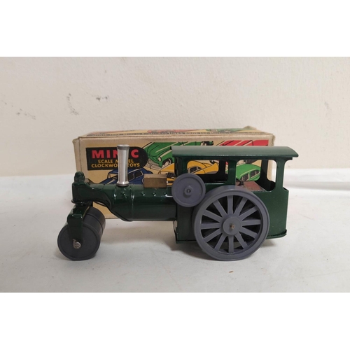 20 - Quantity of clockwork Tri-ang Minic model cars to include two steam rollers, two delivery vans, Vaux... 