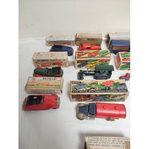 20 - Quantity of clockwork Tri-ang Minic model cars to include two steam rollers, two delivery vans, Vaux... 