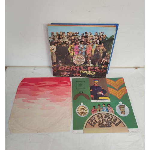 586 - Beatles records to include the Beatles Red & Blue albums, Beatles Ballads and a first UK pressin... 