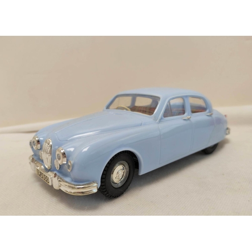 22 - Tri-ang 1/20 scale Electric 2.4 Litre Jaguar in sky blue paint. Original box present but bashed and ... 