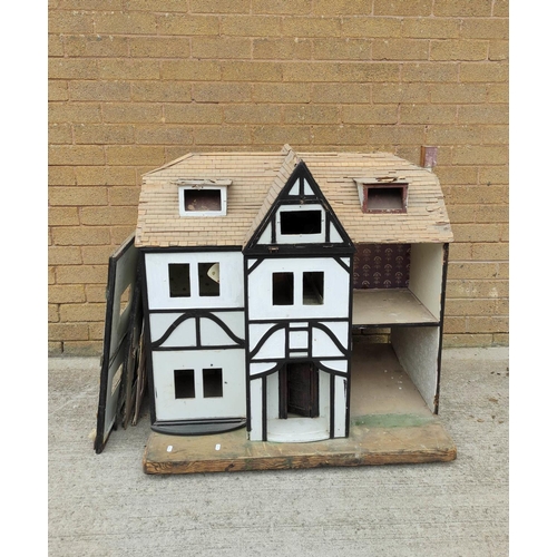 43 - Vintage child's doll's house in need of restoration with traces of electric fittings and balsa wood ... 