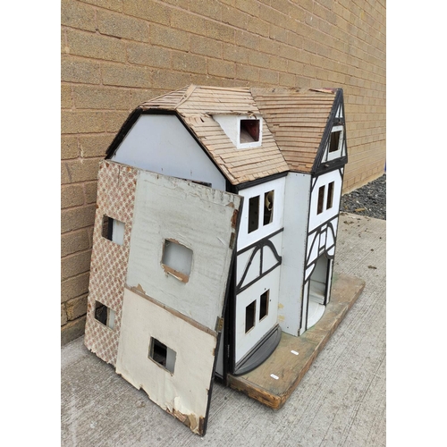 43 - Vintage child's doll's house in need of restoration with traces of electric fittings and balsa wood ... 