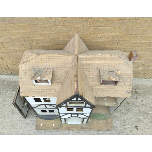 43 - Vintage child's doll's house in need of restoration with traces of electric fittings and balsa wood ... 