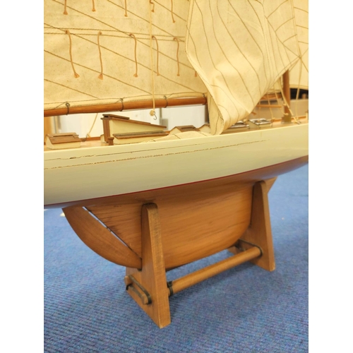 55 - Large model sailing ship by Nauticalia of London with wooden hull and canvas sails.