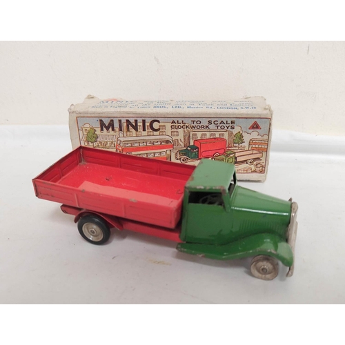 21 - Collection of vintage boxed and loose Tri-ang Minic clockwork vehicles some pre war to include a Min... 