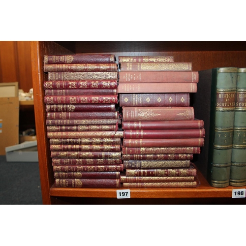 197 - Thirty-three red leather, and other books, to include Collins Castles.