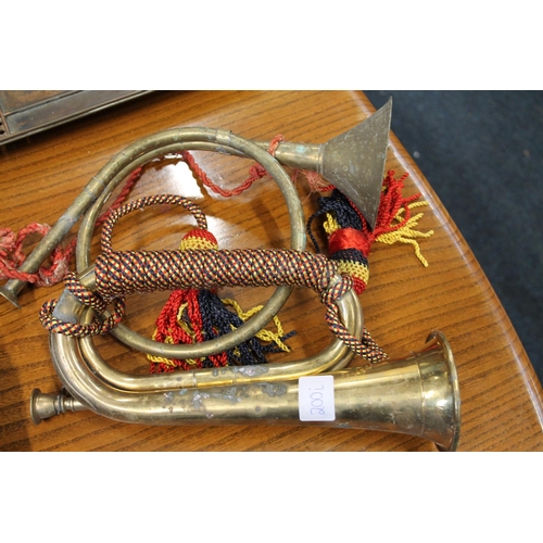 200i - Brass bugle, and another.