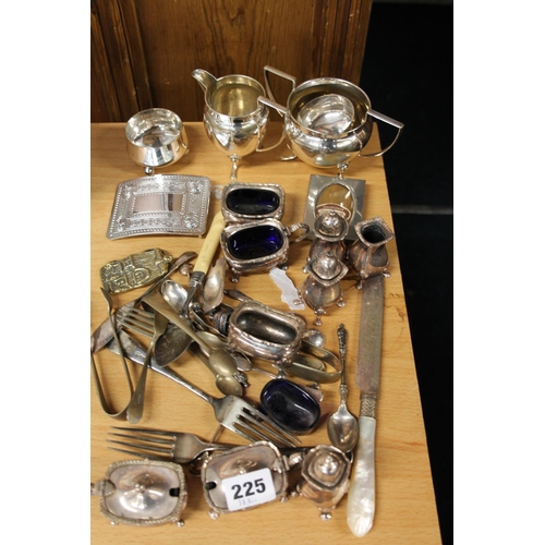 225 - Silver-plated condiments, a sugar and cream, a belt buckle, a mother-of-pearl handled knife, etc.