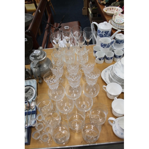 300 - Glass ware to include cut-crystal glasses, wine glasses, etc.