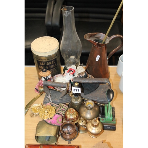 311 - Brass hand-bell, flat irons, a copper jug, a brass toasting fork, dolls, etc.