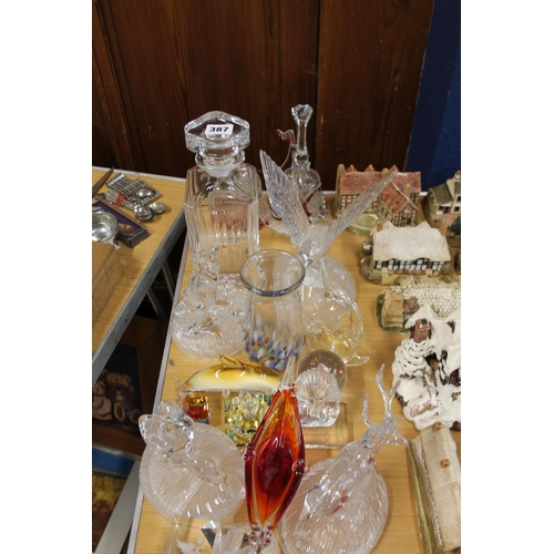 387 - Glass ware to include decanters, an Art Glass vase, animal models, etc.