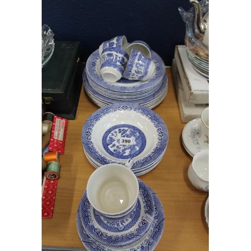 390 - Staffordshire blue and white Willow pattern dinner service.