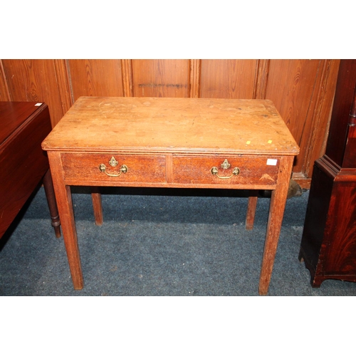 815 - Oak two drawer hall table.