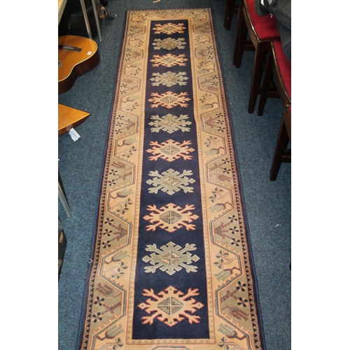 849 - Belgian wool blue ground runner, 269 x 70cm.