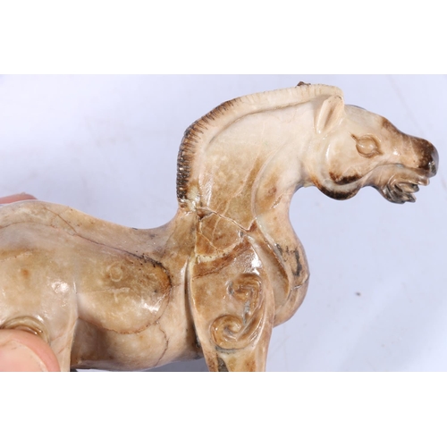 111 - Oriental carved soapstone model of a horse, 13cm long. (a/f)