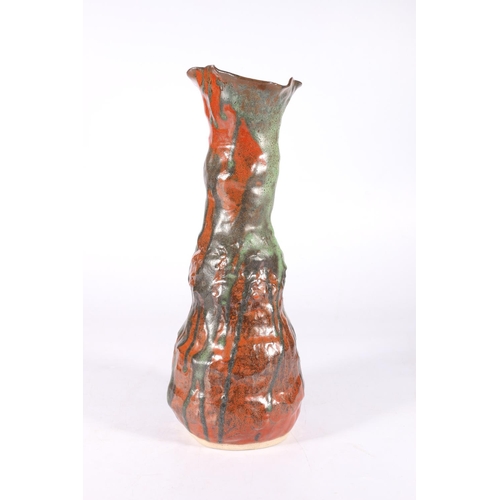 113 - Large Studio Pottery drip-glaze vase of rustic shape, signed P to base, 33cm tall.