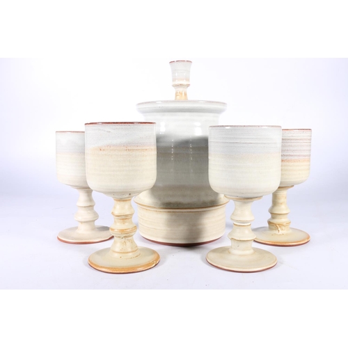 126 - James Guy of Kirkintilloch studio pottery biscuit barrel and cover and four matching goblets. (5)