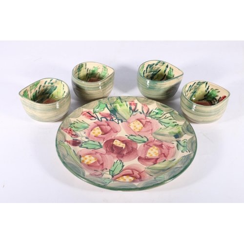 128 - Crail Pottery hand-painted pottery dish and four matching pouring vessels, signed with SM08 monogram... 