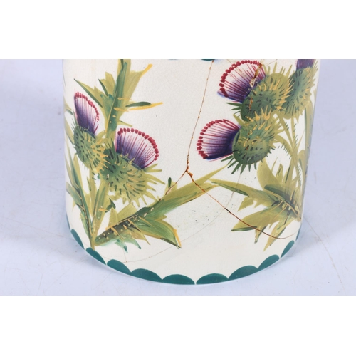 131 - Wemyss Pottery thistle pattern tobacco jar and cover, 16cm tall.