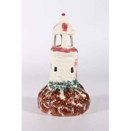 136 - Pottery pastel burner in the form of a lighthouse, 22cm tall. 