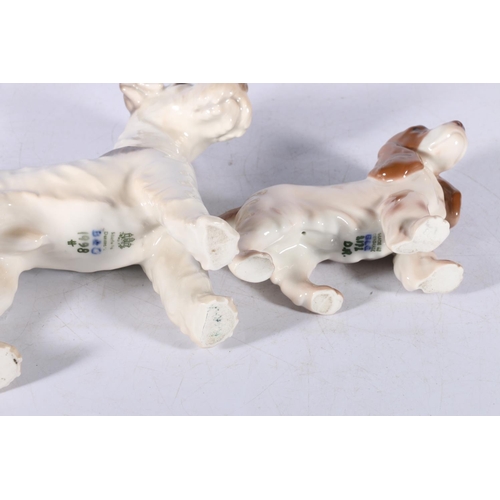 150 - Bing & Grondahl Denmark porcelain model of a terrier dog, 15cm long, and another of a spaniel, 1... 