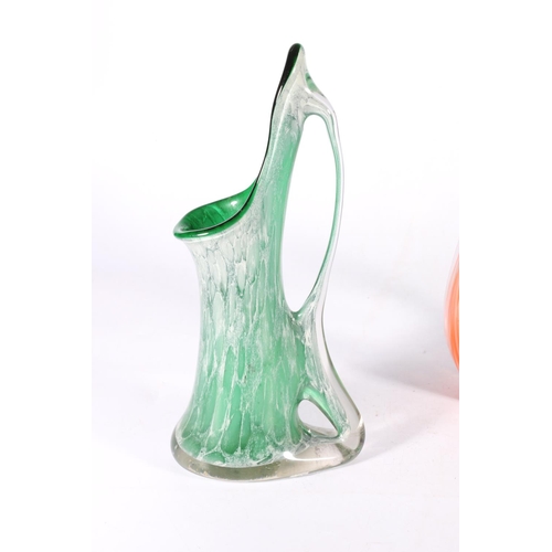 38 - Murano style Art Glass bird sculpture and a mottled green Art Glass ewer vase.