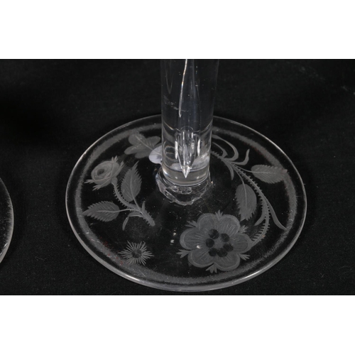 48 - Antique style stemmed glass, with flaring bowl and etched floral decoration to the foot, and another... 