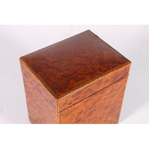 74 - 19th century birds eye maple tea caddy, 15cm tall.