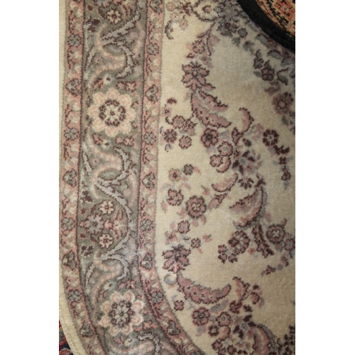 840 - Cream ground, floral field and borders decorated rug, 150 x 90cm.