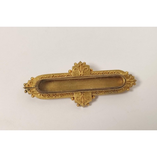 10 - Victorian gold plaque brooch with beaded decoration, probably 15ct, 5.6g.