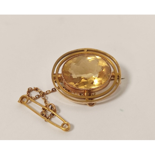 3 - Gold oval brooch with citrine within double border, probably 9ct, 3.7g.