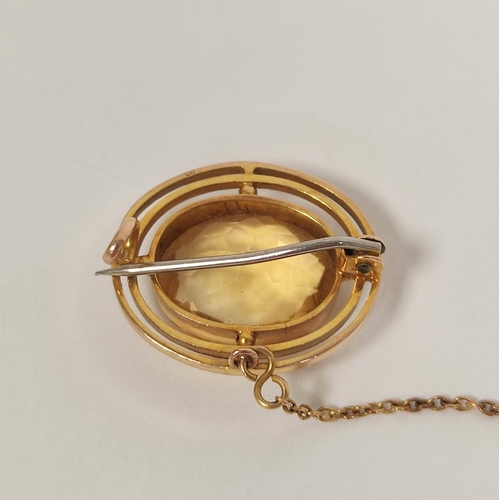 3 - Gold oval brooch with citrine within double border, probably 9ct, 3.7g.