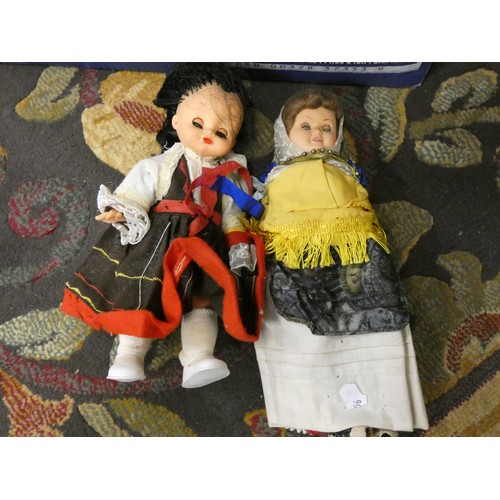 149 - Two boxes of miscellaneous items to include dolls, brassware, etc.